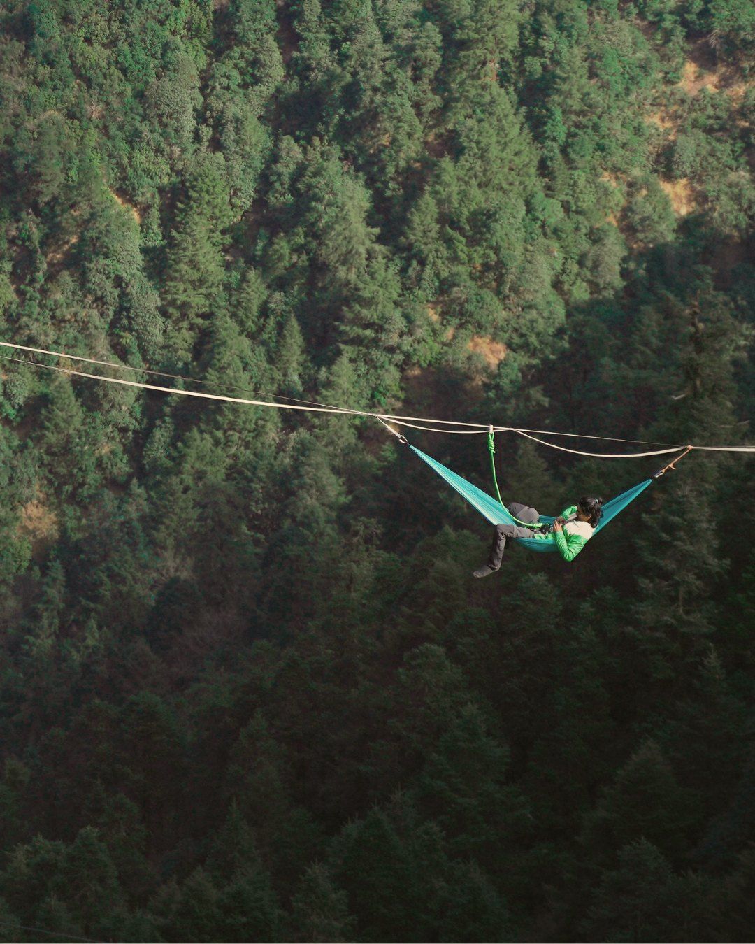 A Yachu hammock on a highline above the forest at Bethanchowk
