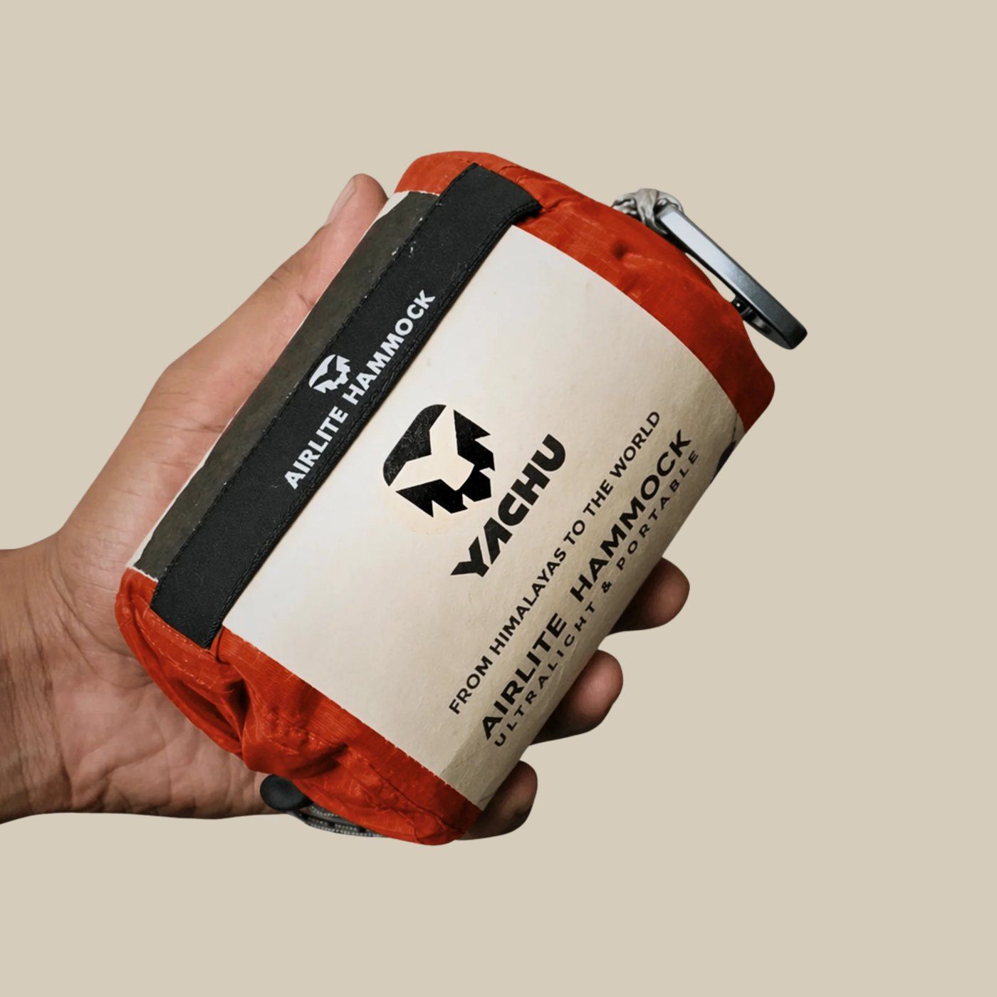 The whole Airlite Hammock Set packed in its pouch, held in one hand